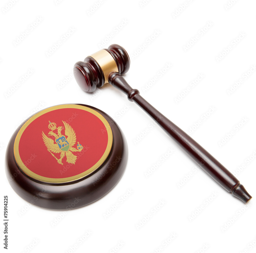 Judge gavel and soundboard with national flag on it - Montenegro