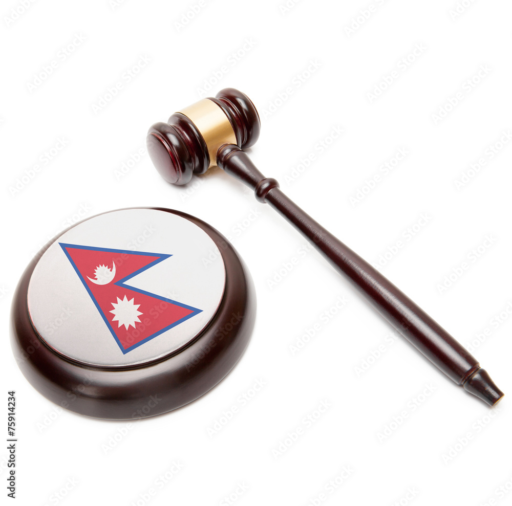 Judge gavel and soundboard with national flag on it - Nepal