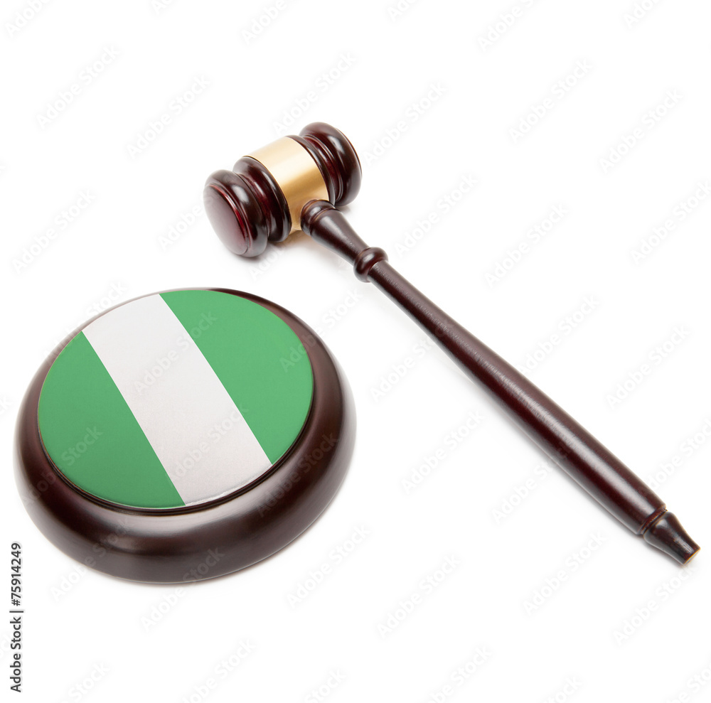 Judge gavel and soundboard with national flag on it - Nigeria