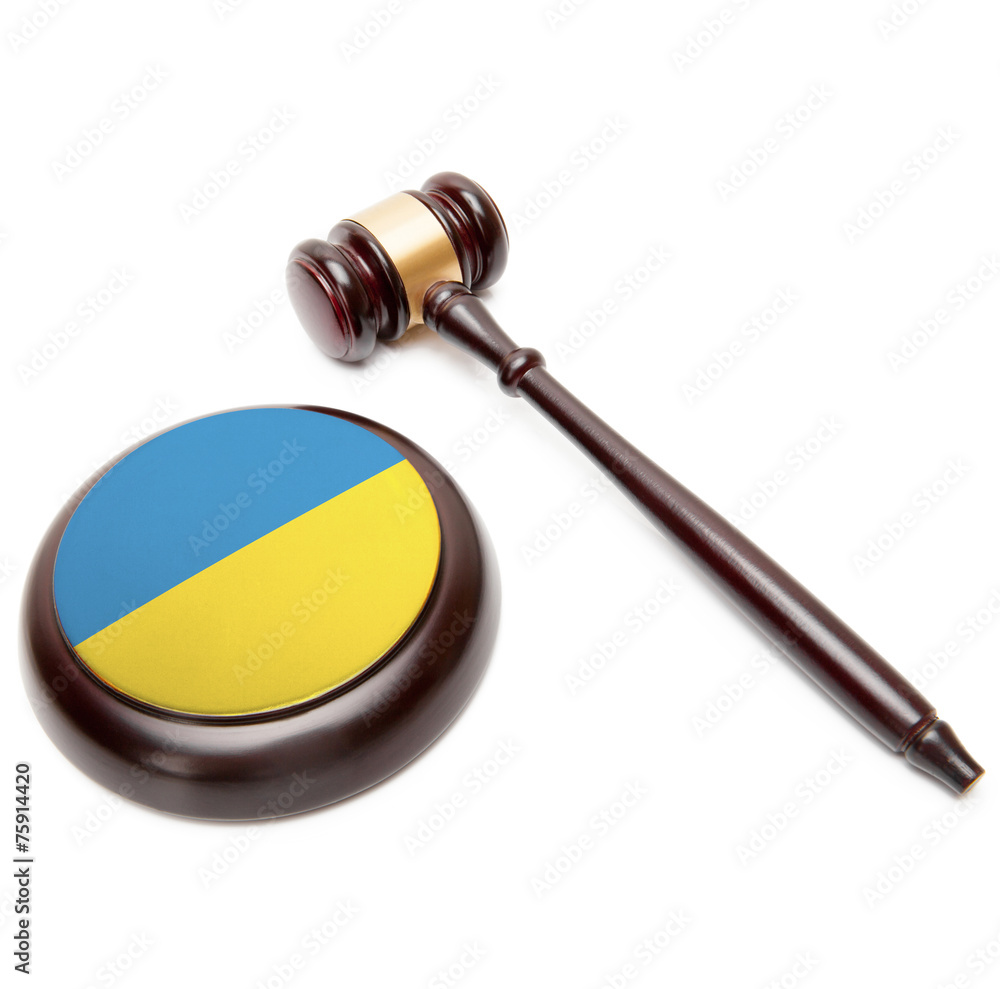 Judge gavel and soundboard with national flag on it - Ukraine