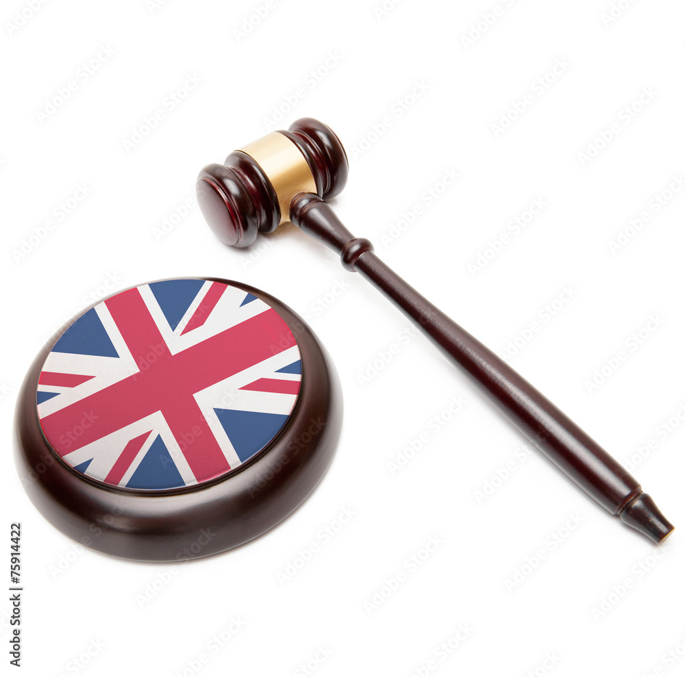 Judge gavel and soundboard with flag on it - United Kingdom