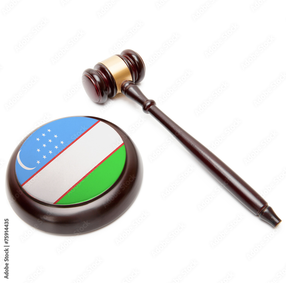 Judge gavel and soundboard with national flag on it - Uzbekistan