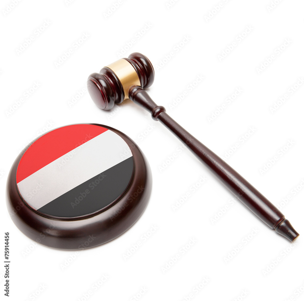 Judge gavel and soundboard with national flag on it - Yemen