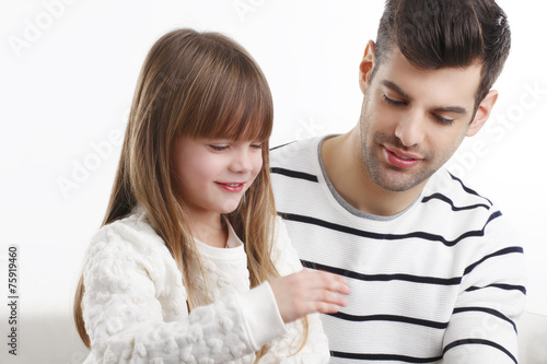 Young father and his daugther