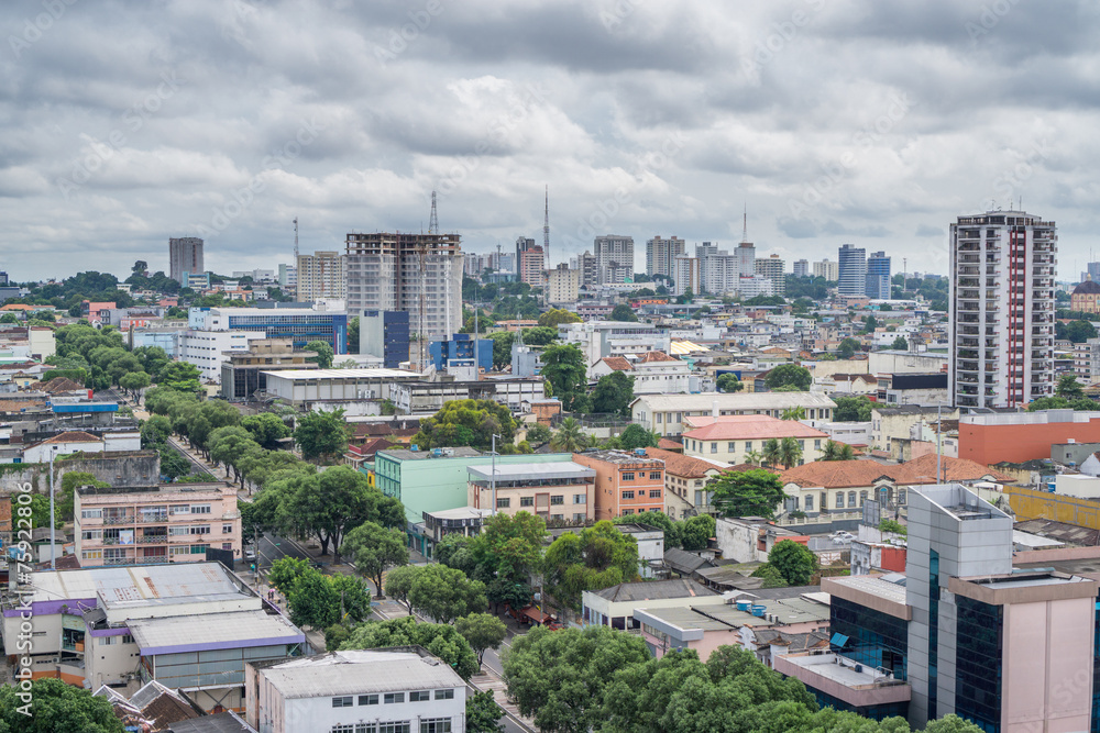 Fototapeta premium Colorful houses, cloudy sky in Manaus, Brazil