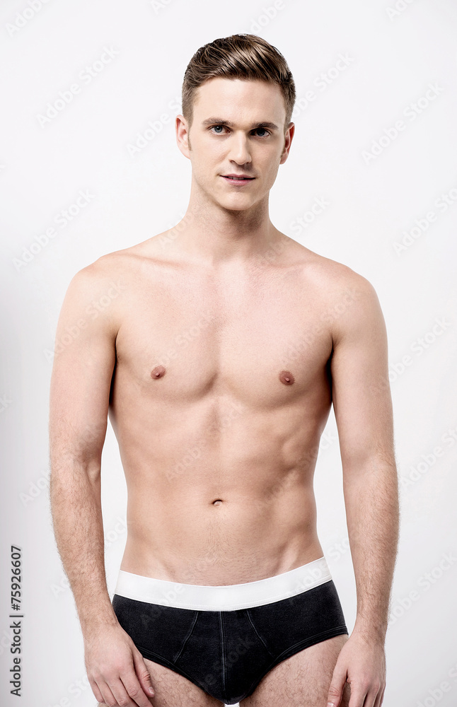 Fototapeta premium Healthy fit young man in underwear
