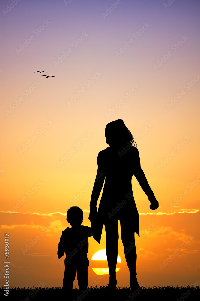 Fototapeta premium mother and son silhouette at sunset