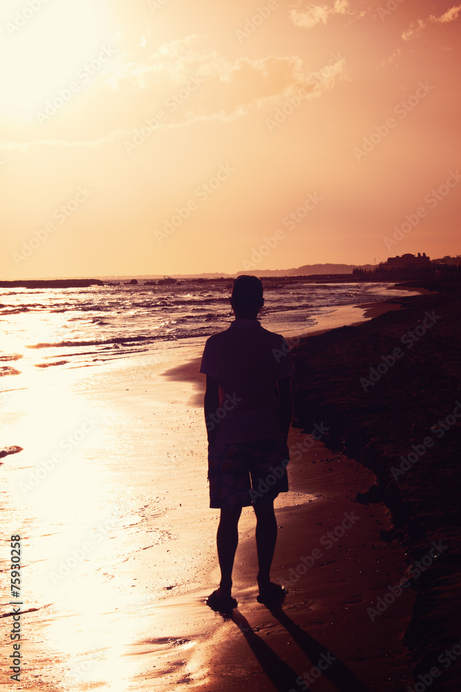 summer holidays man alone at beach