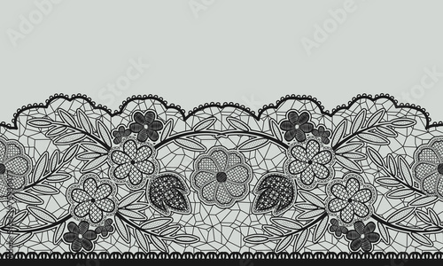 Seamless floral lace ribbon on gray.