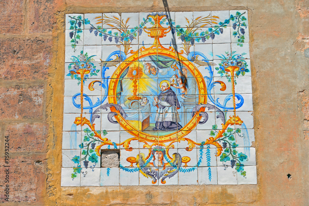 Obraz premium handbemaltes religiöses Fliesenschild an der Fassade in Valencia