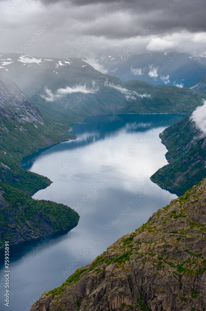 The summer view of Trolltunga in Odda, Norway The summer view of Trolltunga in Odda, Norway
