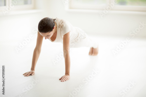 Woman Doing Yoga In Room