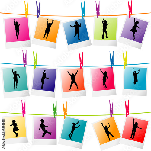 Colorful photo frames with children silhouettes hanging on a rop