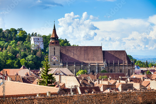 The Black Church cathedral and The White Tower in Brasov medieva photo