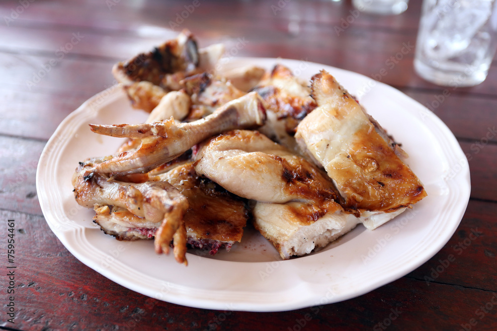 Grilled chicken in dish. Grilled chicken in dish.