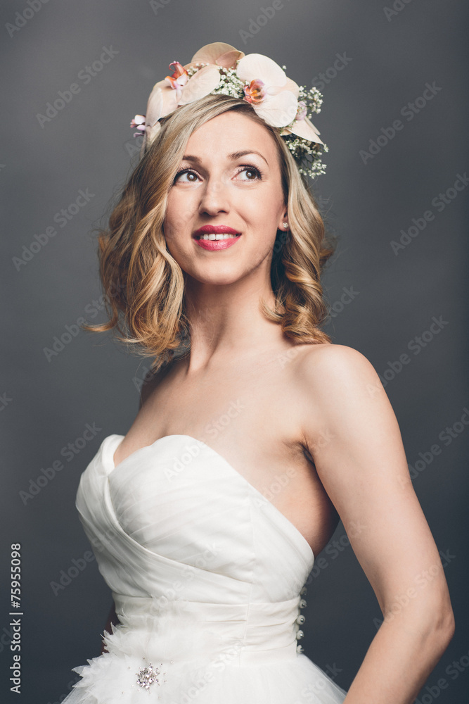 Elegant pretty bride with flowers in her hair