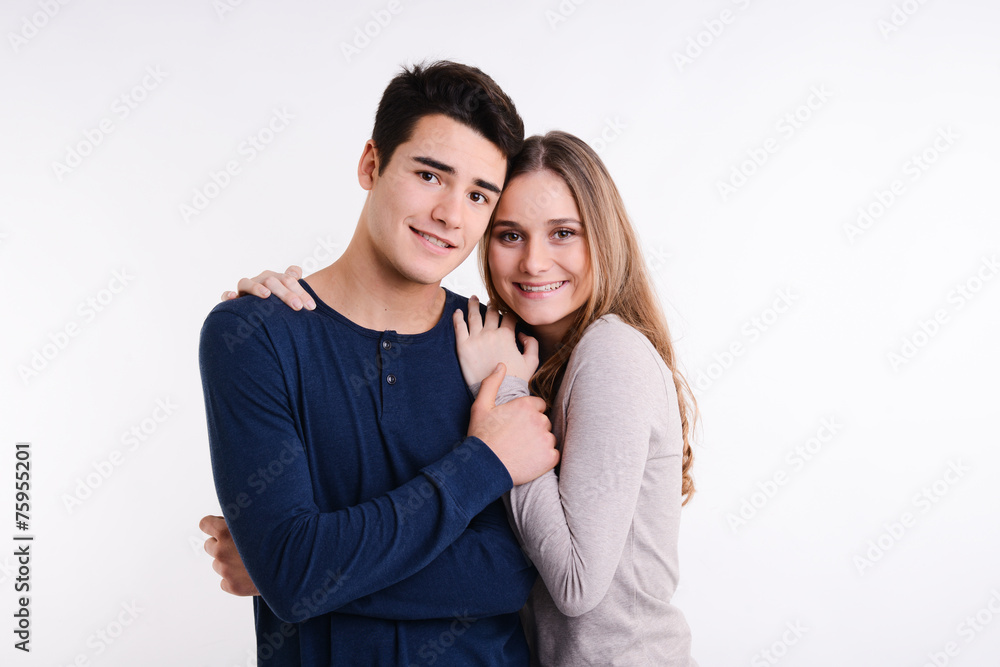 isolated beautiful young couple on white background isolated beautiful young couple on white background