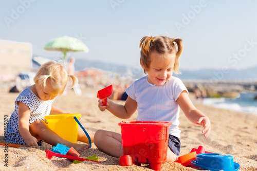  children playing with sand © DariaTrofimova