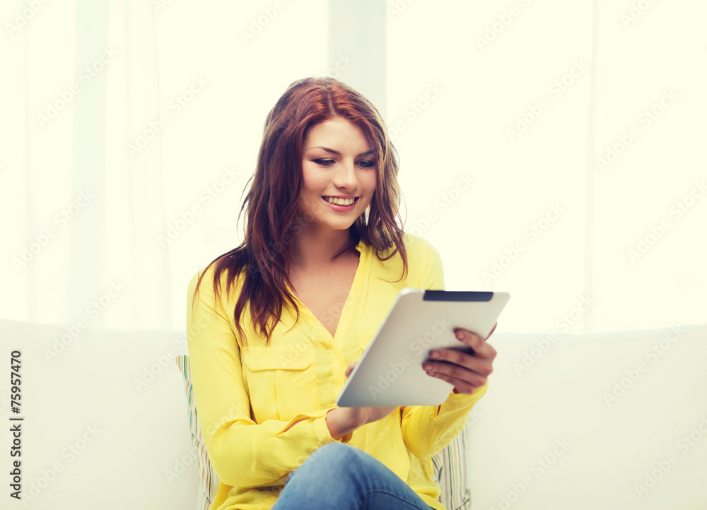 smiling woman with tablet pc computer at home smiling woman with tablet pc computer at home