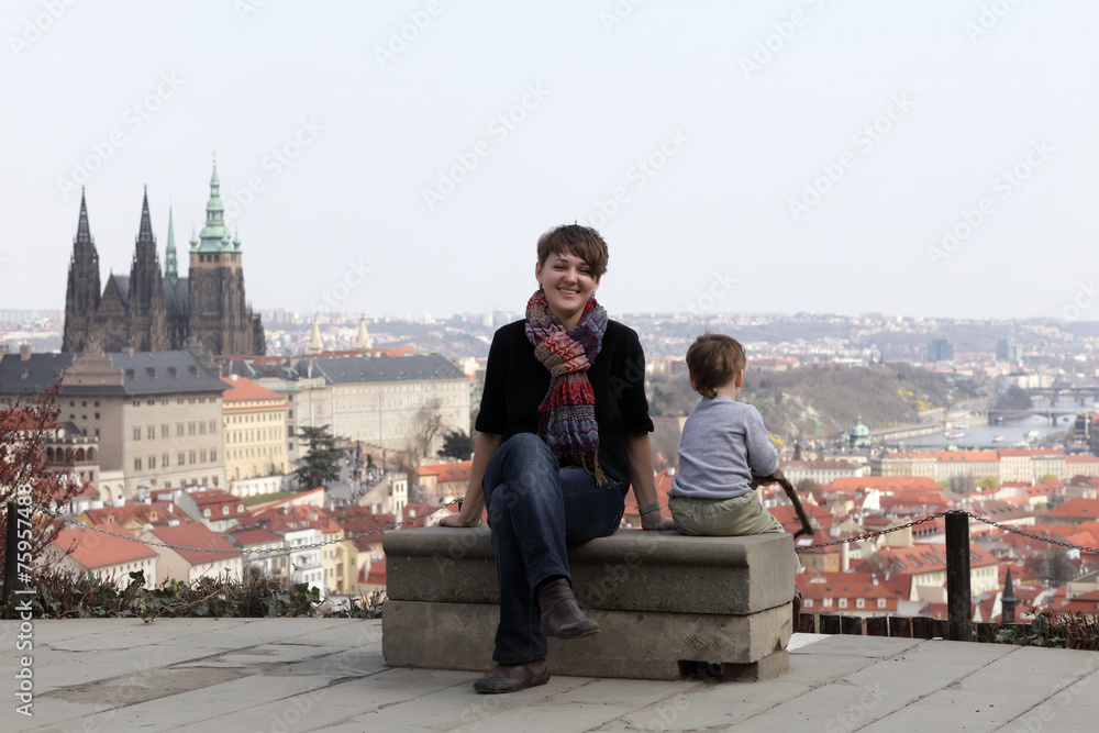 Mother with son on St. Vitus Cathedral background