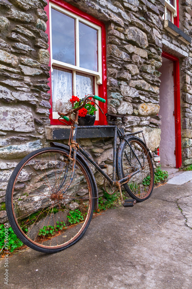 Old rusty bike at Irish cottage house