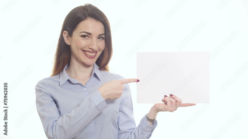 smiling woman blue shirt pointing blank piece paper copy space smiling woman blue shirt pointing blank piece paper copy space