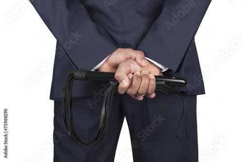 Bilde på lerret Leather whip held by dominant master in a suit