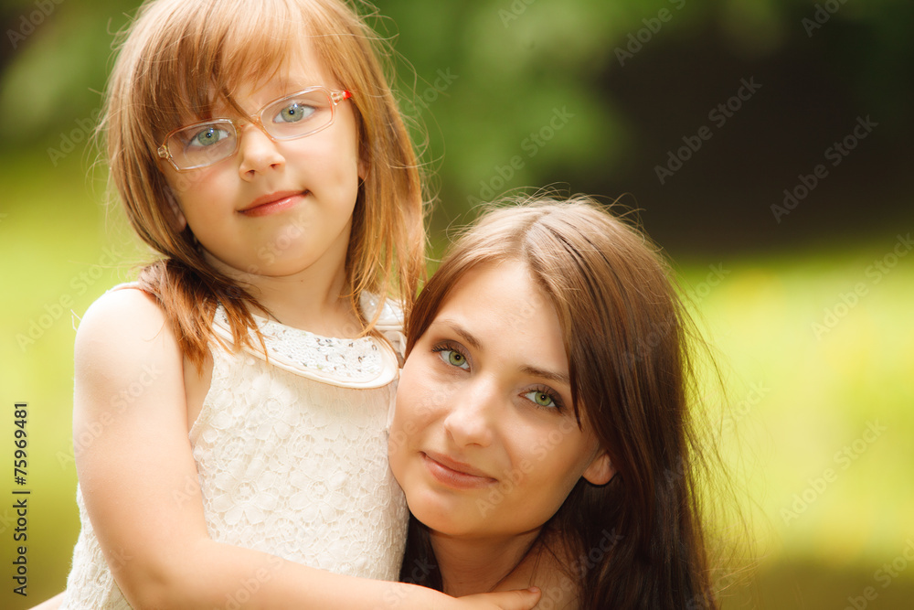 Little girl hugging his mother expressing tender feelings. Love. Little girl hugging his mother expressing tender feelings. Love.