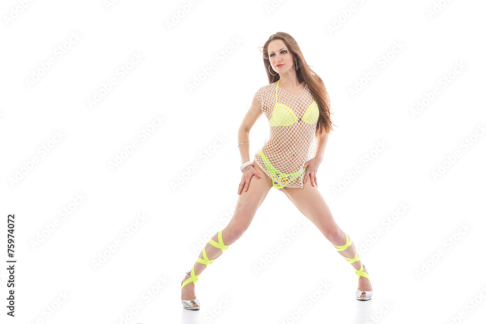 Brunette in bright yellow shorts, bra, heels and ribbons on legs Brunette in bright yellow shorts, bra, heels and ribbons on legs