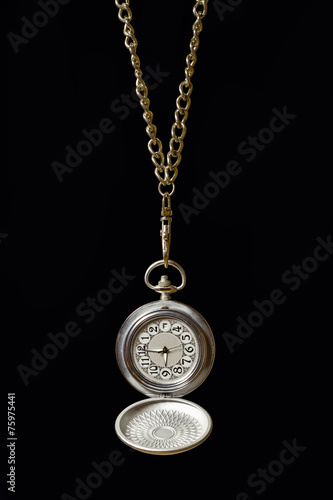 Pocket watch on a long chain.