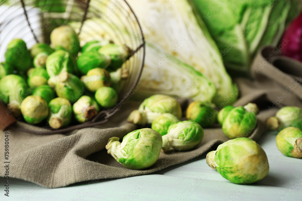 Still life with assortment cabbages on wooden background Still life with assortment cabbages on wooden background