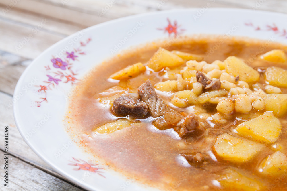 A dish of traditional Hungarian goulash, closeup A dish of traditional Hungarian goulash, closeup