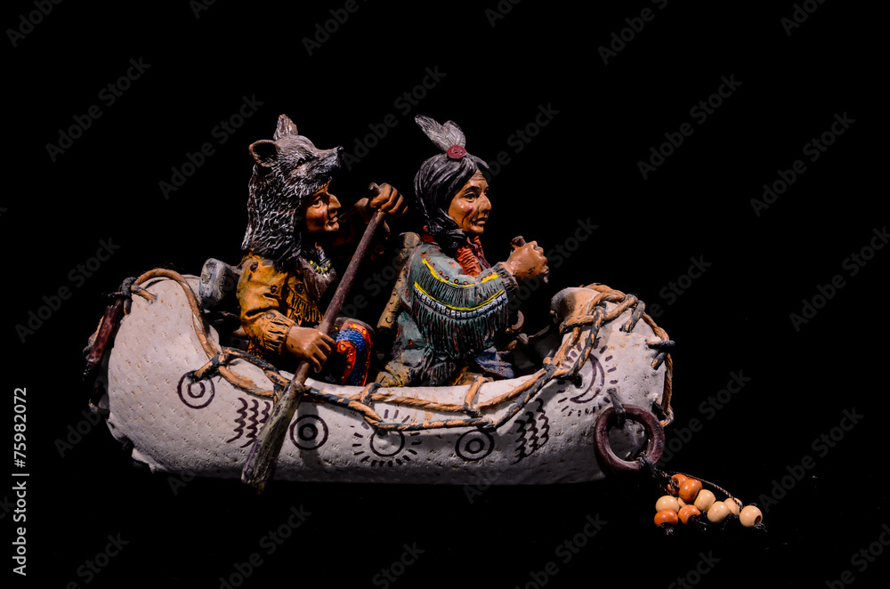 Obraz premium North American Indian Canoe Statue