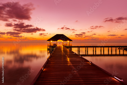 Fototapeta Naklejka Na Ścianę i Meble -  Water cafe at sunset - Maldives
