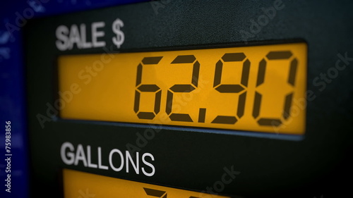 Closeup on gas pump display showing price of an arm and a leg