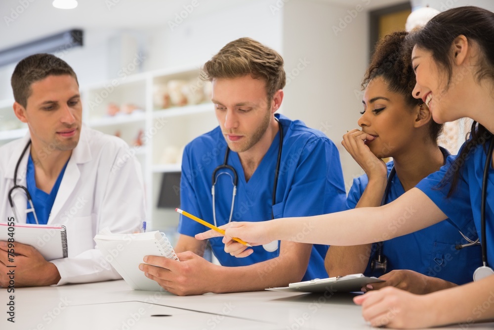 Medical students sitting and talking Medical students sitting and talking