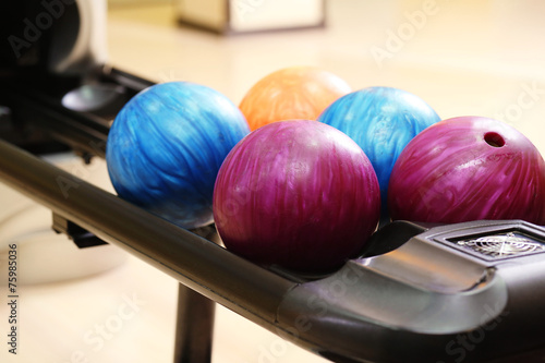 Colorful Bowling balls in ball return