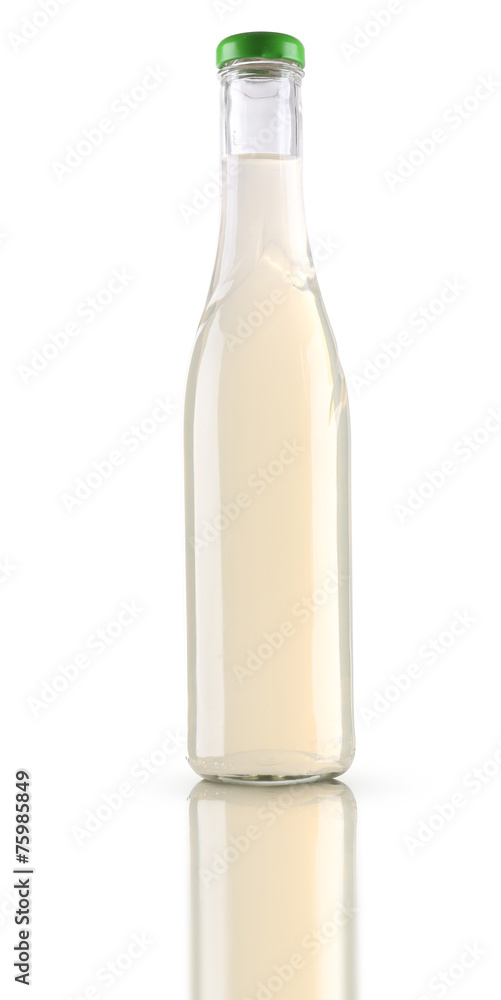 Colorful alcoholic beverage in glass bottle isolated on white