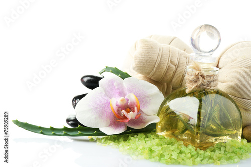 Spa treatments with orchid flower isolated on white