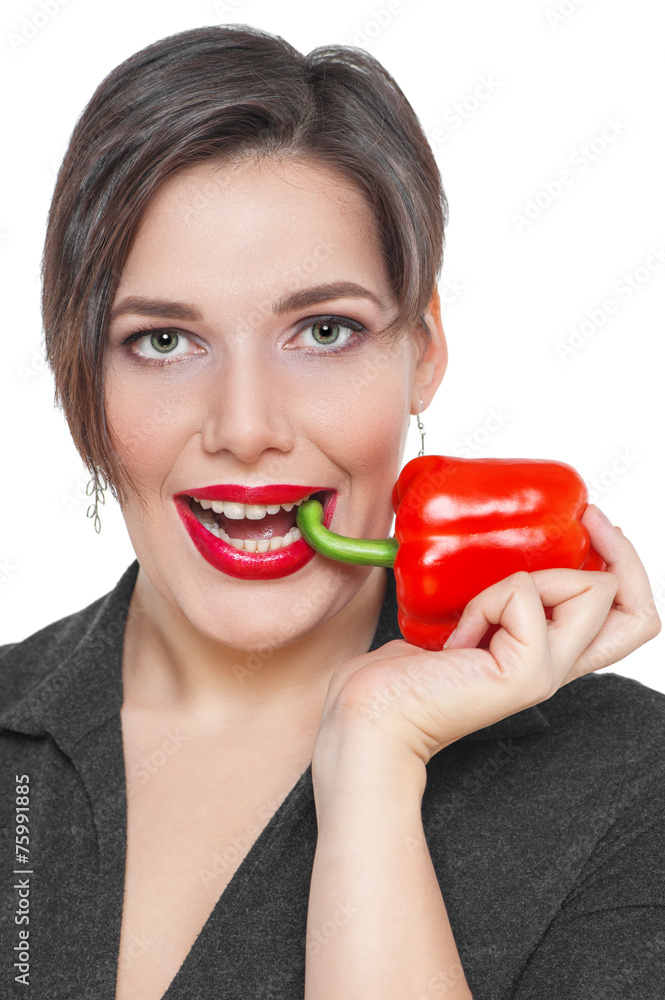 Beautiful plus size woman with red pepper isolated Beautiful plus size woman with red pepper isolated
