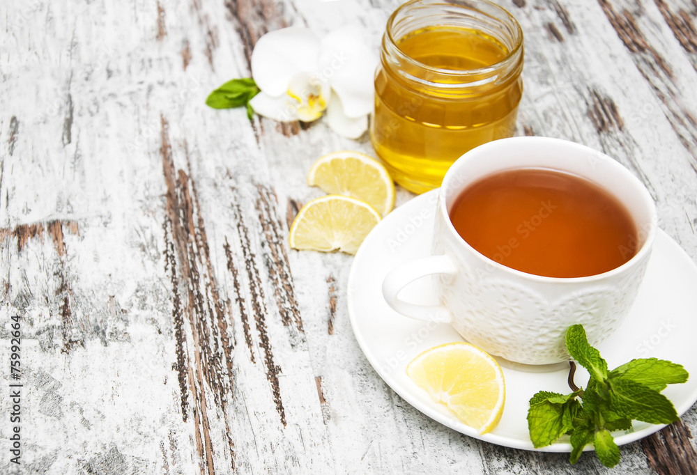 Cup of tea with lemon and honey Cup of tea with lemon and honey