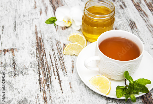 Cup of tea with lemon and honey