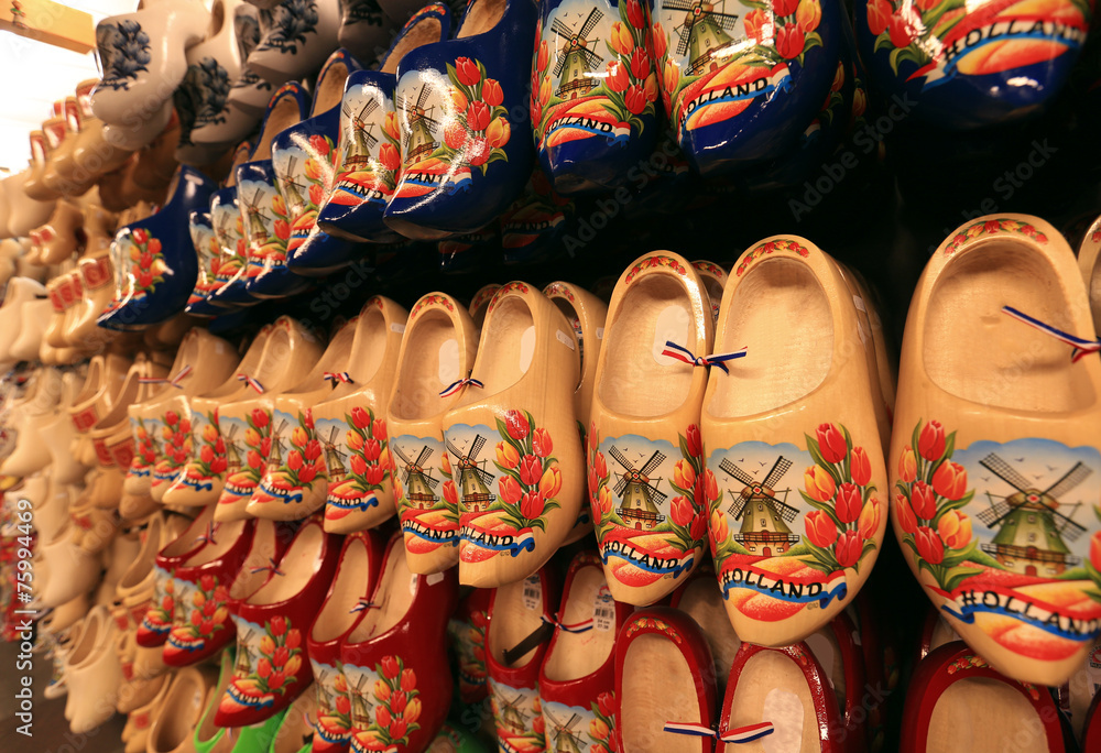 Naklejka premium Dutch Souvenirs, a bunch of colored wooden shoes