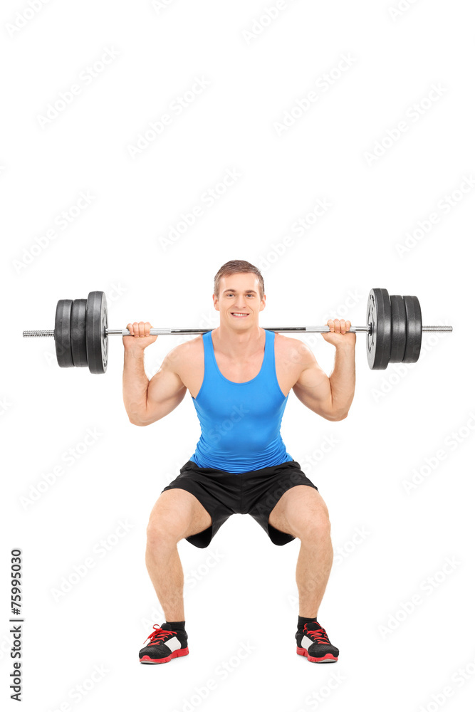 Strong man exercising with a barbell Strong man exercising with a barbell