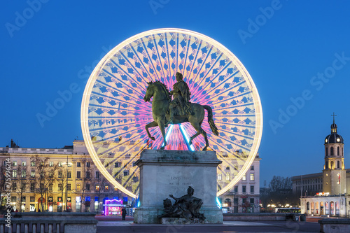 Place Bellecour, famous statue of King Louis XIV by night