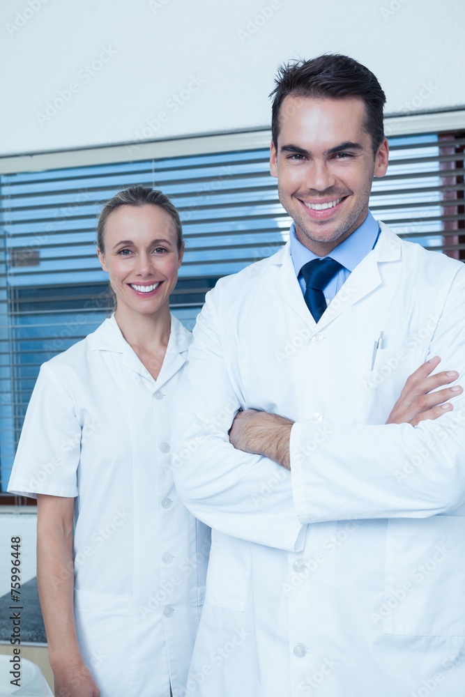 Portrait of smiling dentists Portrait of smiling dentists