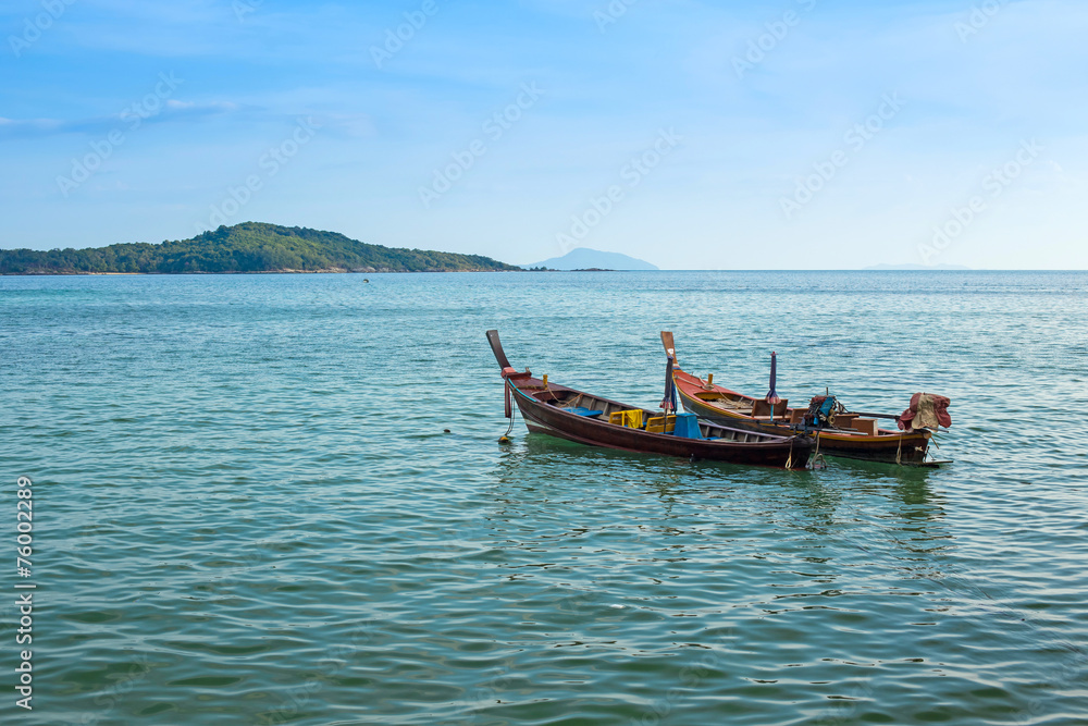 Traditional Thai boats in the Andaman Sea Traditional Thai boats in the Andaman Sea