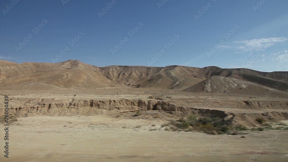 View of passing landscape from a bus window. The South of Israel View of passing landscape from a bus window. The South of Israel