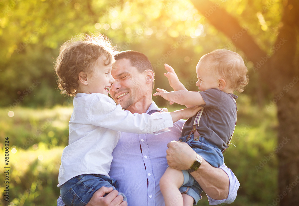 Fototapeta premium Little boys with their dad