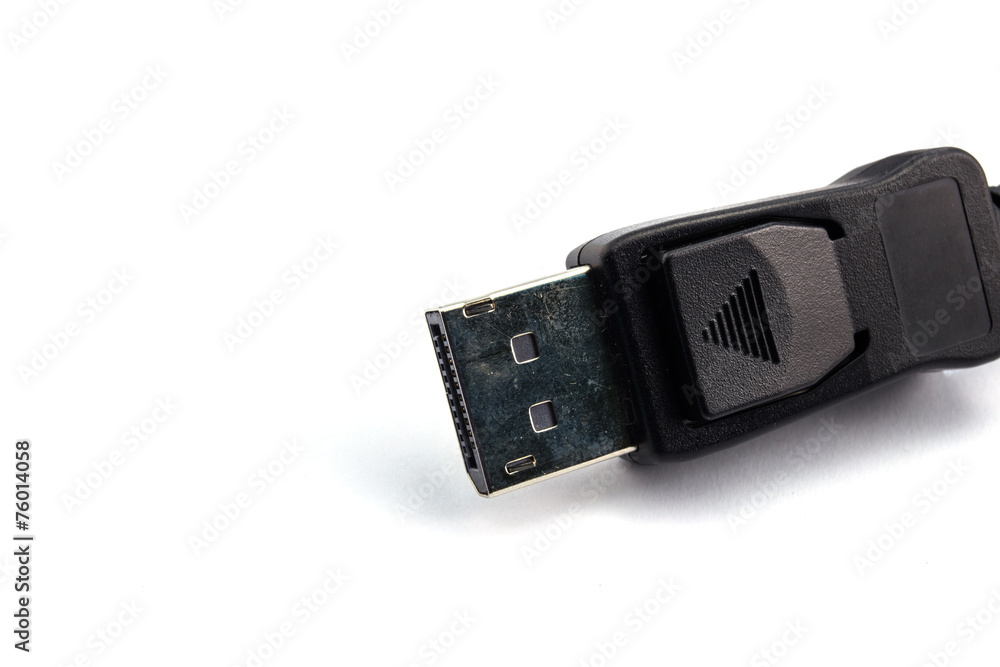 closeup of display port cable on a white background closeup of display port cable on a white background